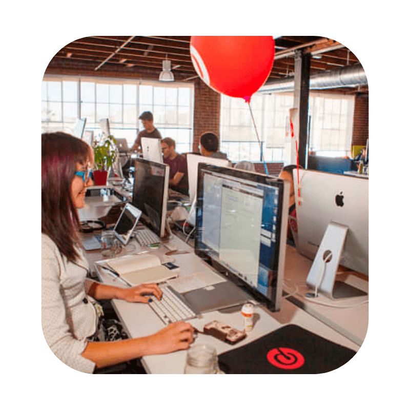 Pinterest office with employee behind a computer