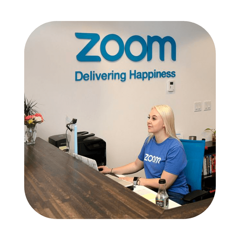 Zoom office with woman behind a computer