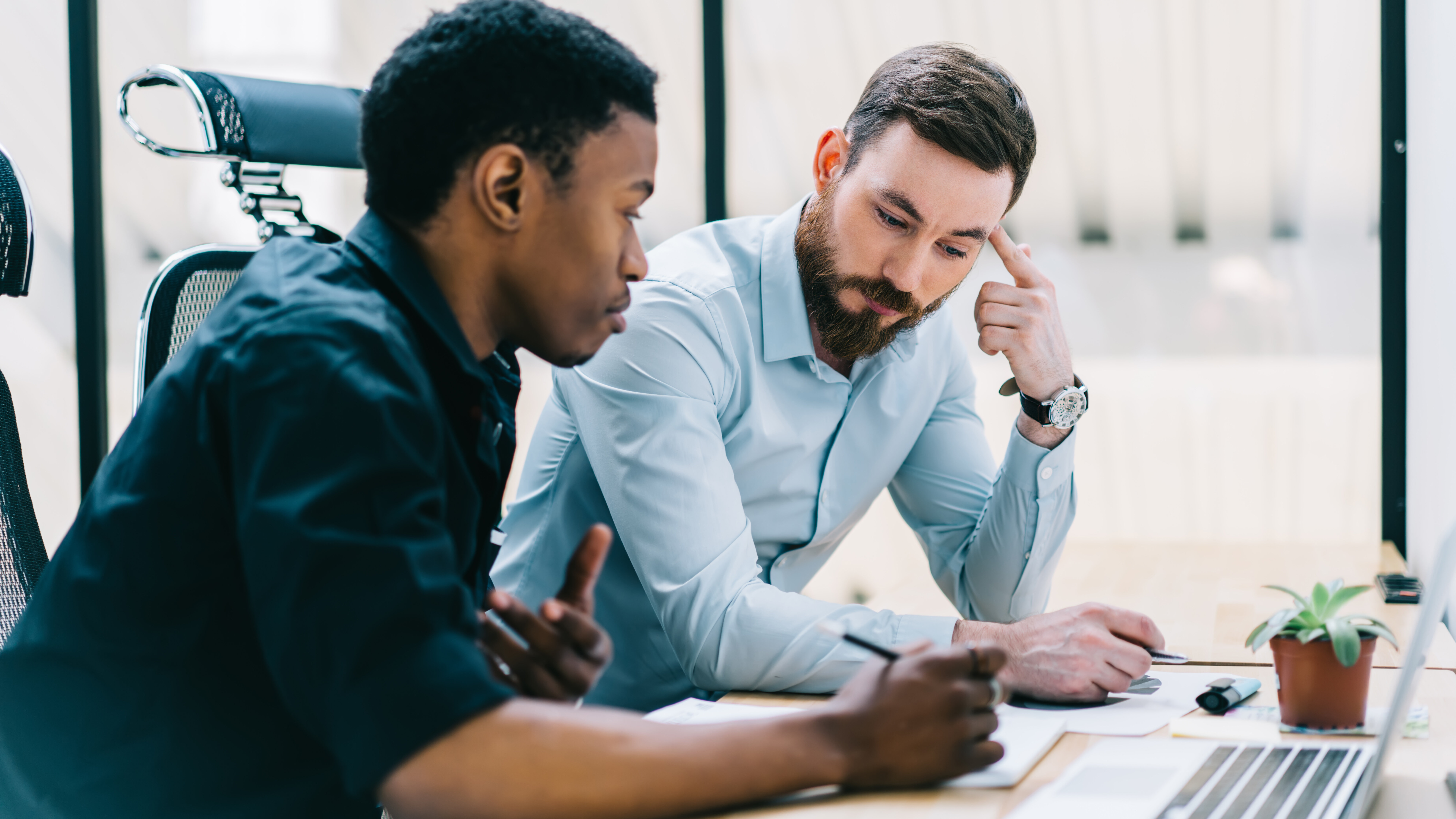 Recruiters in tech collaborating.